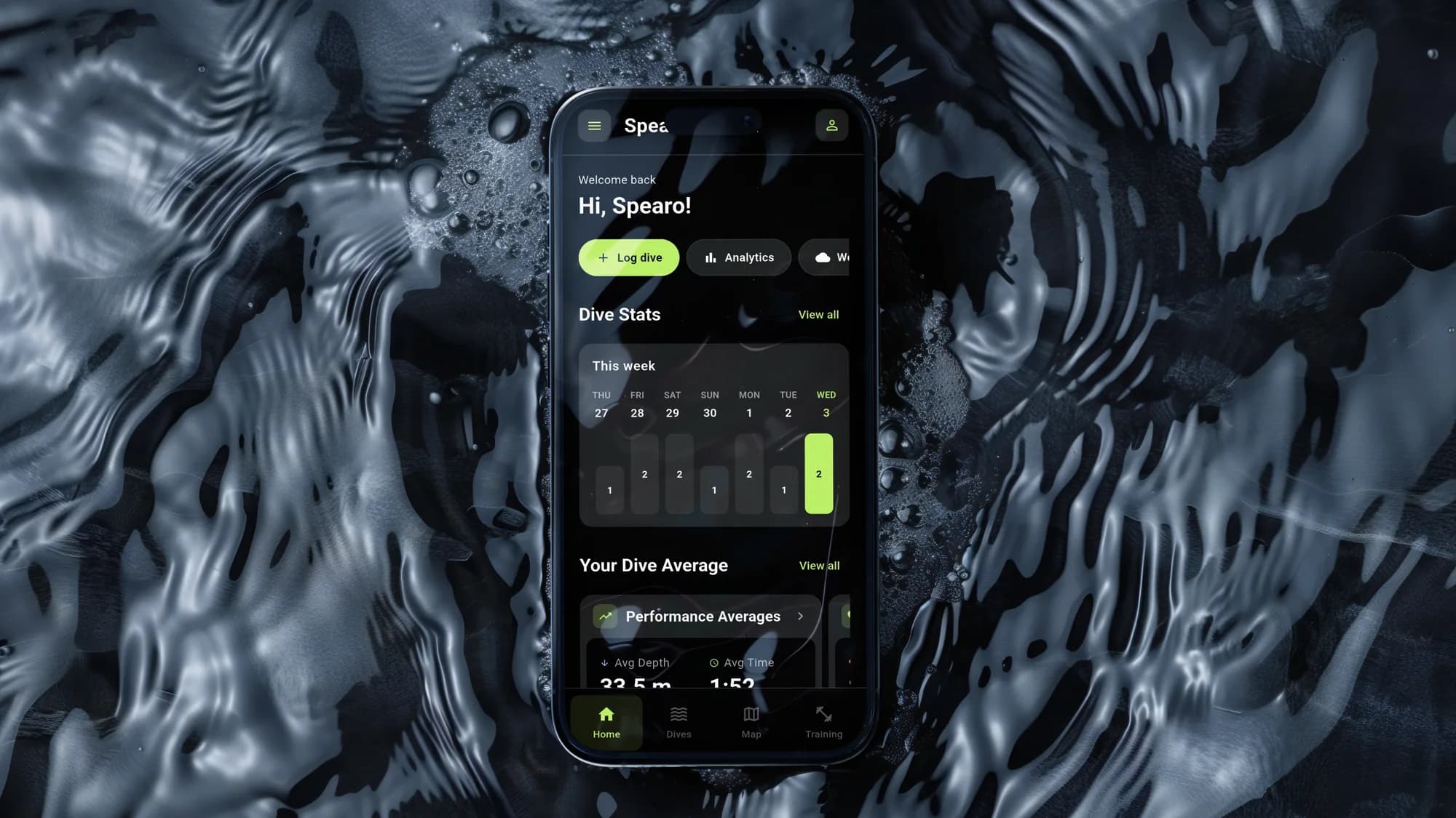 Spearo Tracker's home screen on a phone lying in rippling water